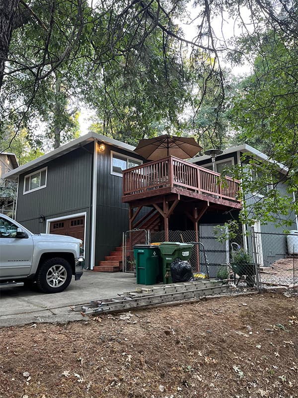 Residential exterior painting and deck refinishing by Bayshore Painters, Inc. in El Dorado Hills Freshly painted residential home with deck and stairs in El Dorado Hills, CA